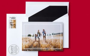 Christmas photo card that says happy with matching envelope liner, circle address label and picture stamp
