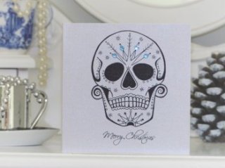 Frosted day of the dead sugar skull on Christmas card, by Vicki Ashurst.