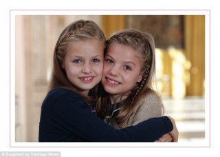 Happy Christmas! A photograph of the Spanish princesses, Leonor, 10, and her younger sister Sofia, 8, appears on the front of King Felipe VI and Queen Letizia's Christmas card, which was released today