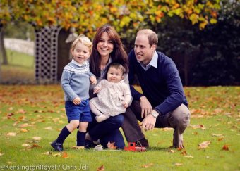 Kate, Will, Charlotte and George smile for holiday photo