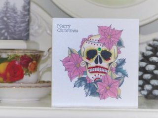 Poinsettia day of the dead skull Christmas card by Vicki Ashurst.