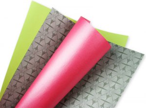 sheets of colorful text weight paper