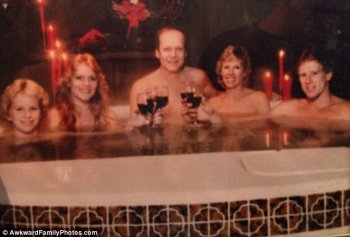 The family that hot tubs together... This family thought it would be a good idea to relax with a drink in the garden with their children - but no doubt didn't realise at the time that the photo makes them appear to be naked